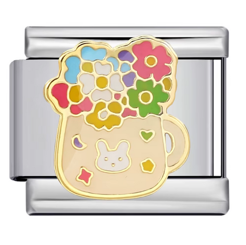 Silver charm with floral design and rabbit illustration on a white background