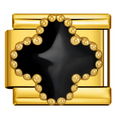 Gold charm with a black clover center on a white background
