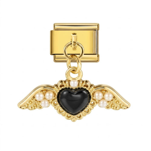 Gold charm with black heart and pearl accents on a white background