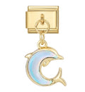 Gold charm with a dolphin design on a white background