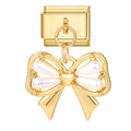Gold bow-shaped pendant with pearl center on a white background