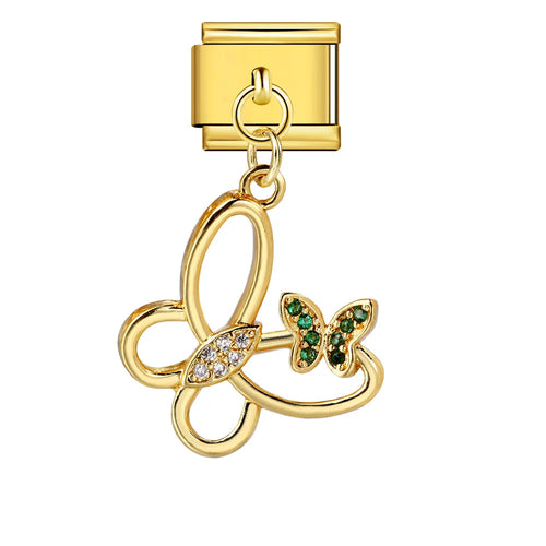 Gold charm with double butterfly design and green gemstone