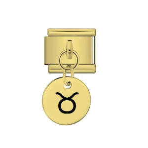 Gold charm with Taurus symbol on a white background