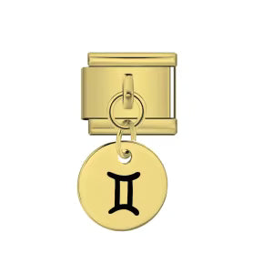 Gold charm with a zodiac symbol on a white background