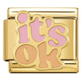 Gold charm with 'it's ok' in pink and brown on a white background