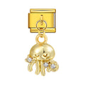 Gold charm with a jellyfish design on a white background