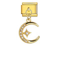 Gold charm with moon and star design on a white background