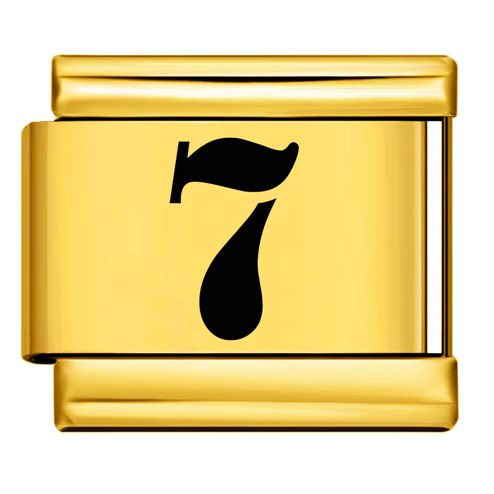 Gold charm with a black number '7' on a white background