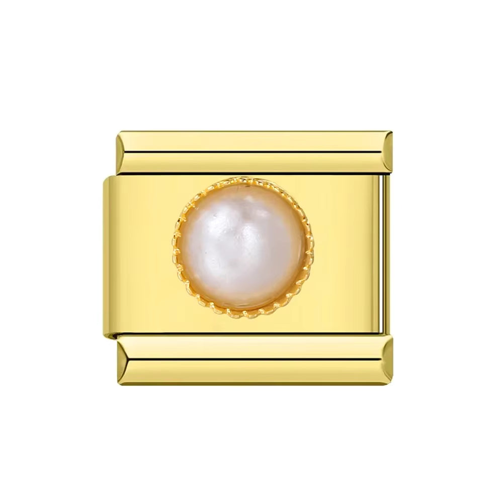 Gold charm with a pearl on a white background