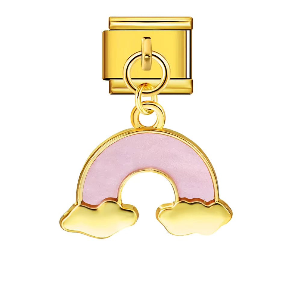 Gold charm with a pink crescent moon design on a white background