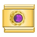 Gold charm with a purple gemstone on a white background