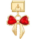 Gold charm with a red heart design on a white background