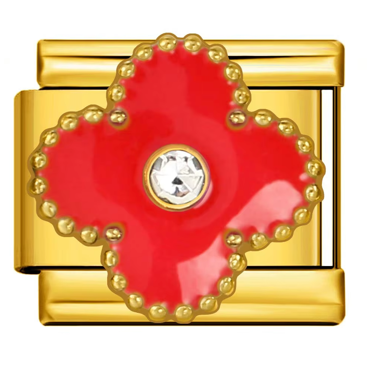 Gold charm with a red clover design and central gemstone on a white background