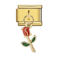 Gold charm with a red rose pendant on a white background