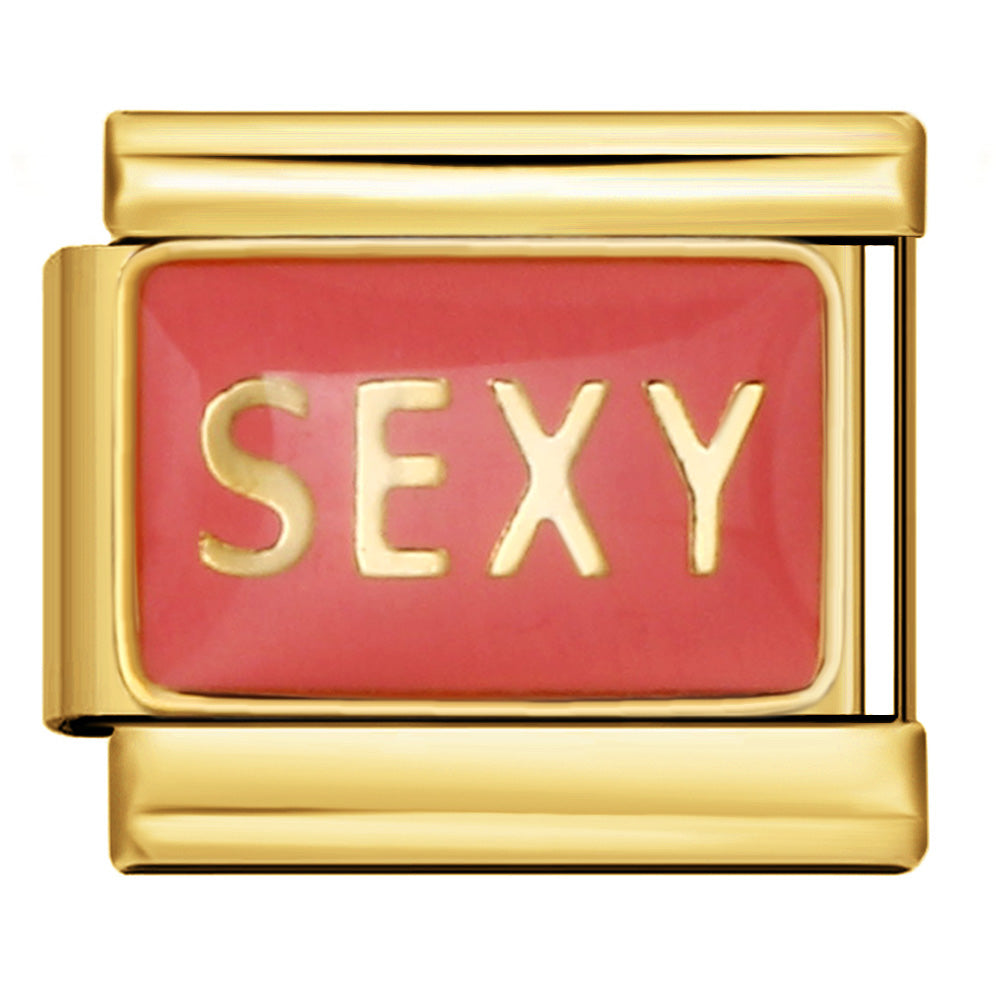 Gold charm with 'SEXY' on a pink background