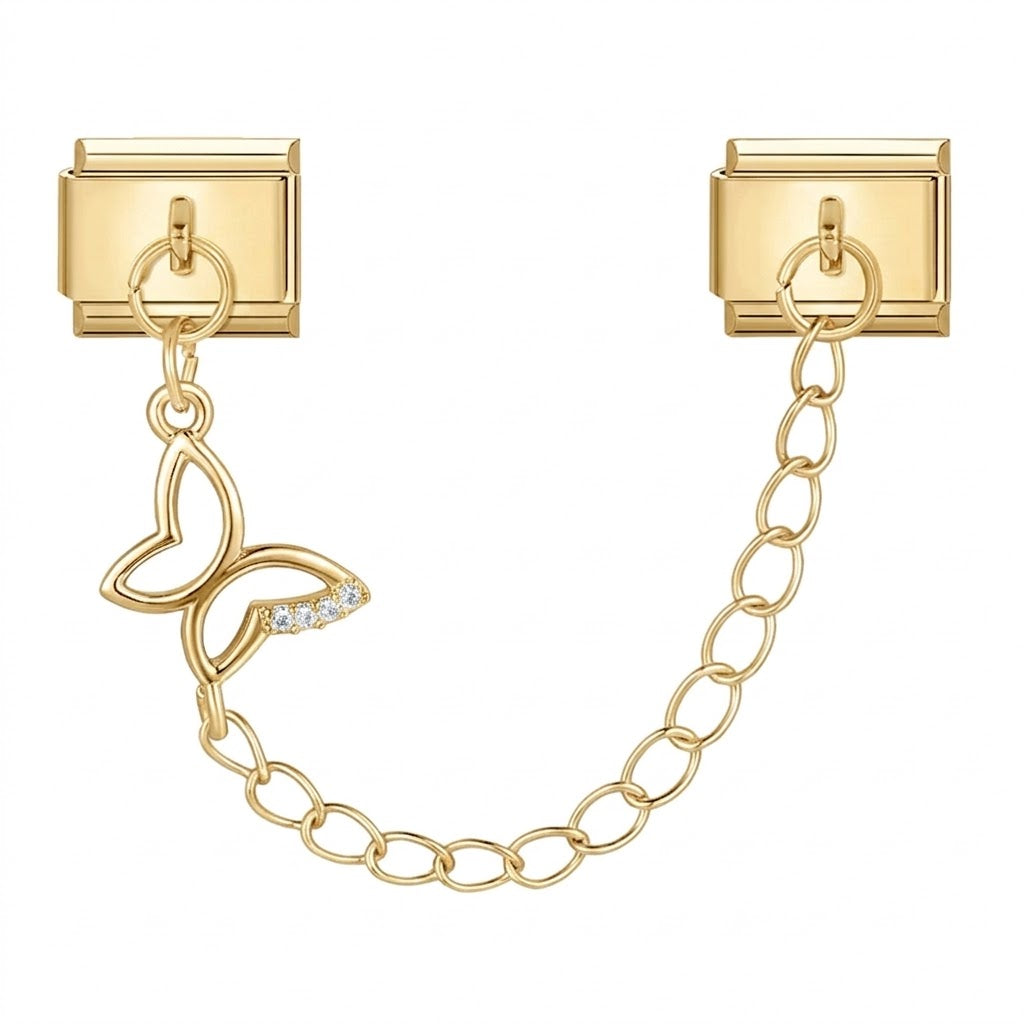 Gold charm with butterfly and chain design on a white background