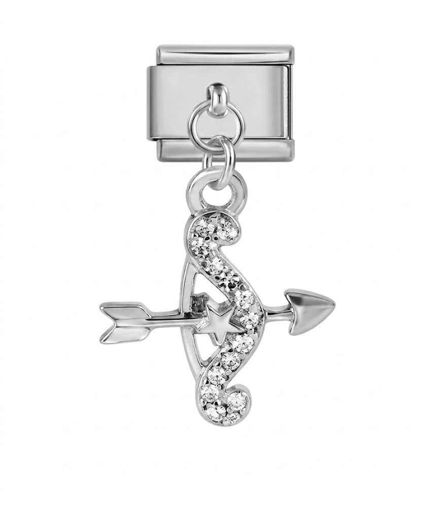 Silver charm with an arrow design on a white background
