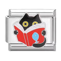 Silver charm with a black cat design reading book on a white background