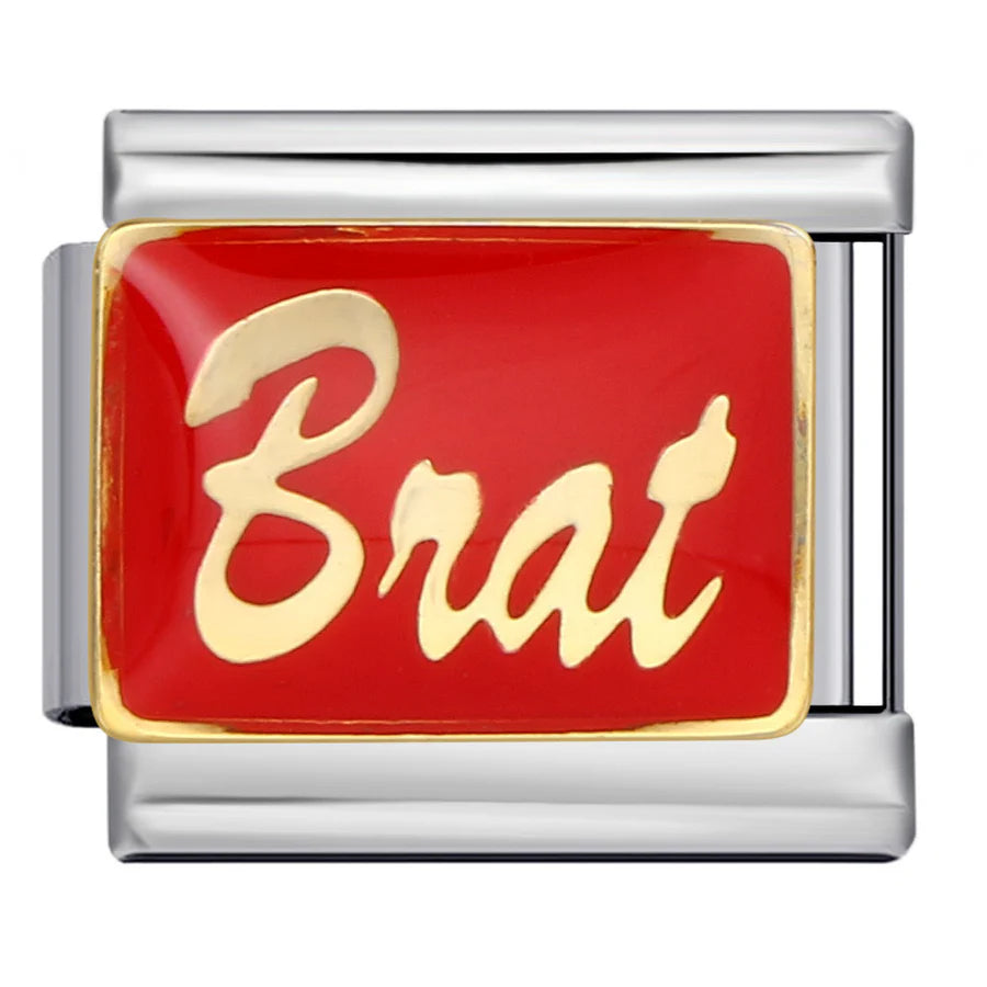 Silver charm with red background and gold 'Brat' text on a white background