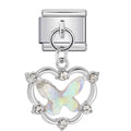 Silver charm with a butterfly design on a white background