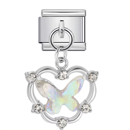 Silver charm with a butterfly design on a white background
