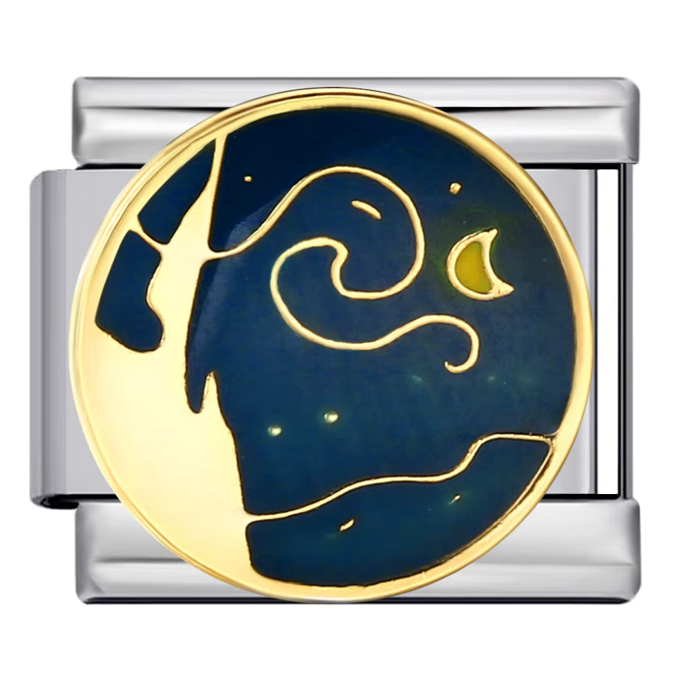 silver charm with night sky design on a white background