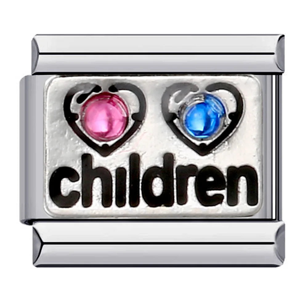 Silver charm with two heart-shaped gemstones and the word 'children'