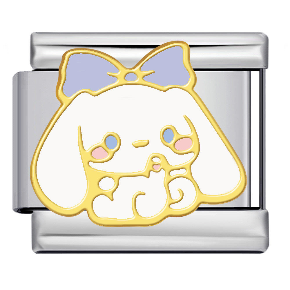silver charm with a cartoon character design on a white background