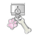 Silver charm with pink paw print and white bone on a white background