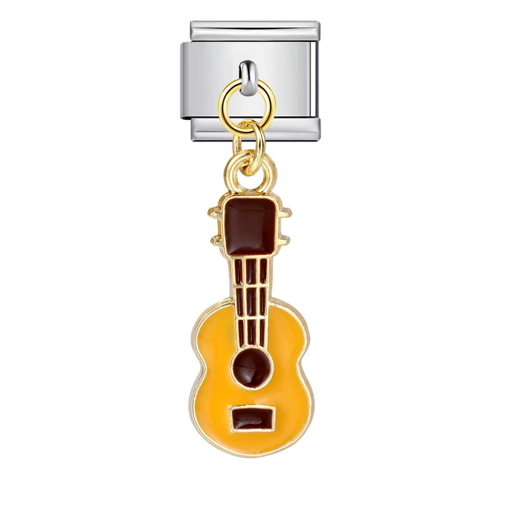 Guitar-shaped charm on a white background