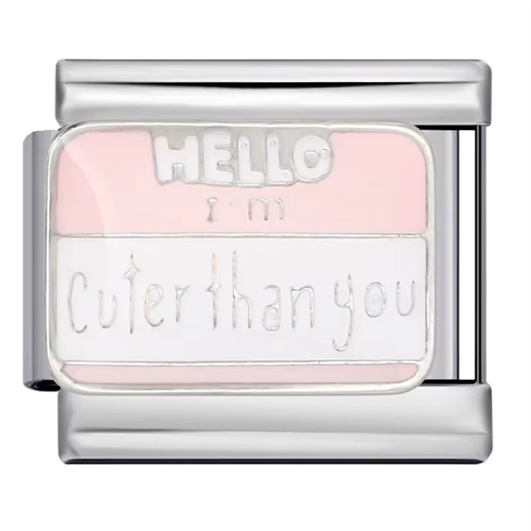Silver charm with pink text 'HELLO I m Cuter than you' on a white background