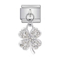 Silver charm with a four-leaf clover design on a white background