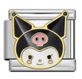 silver charm with black, gold, and pink cartoon design on a white background