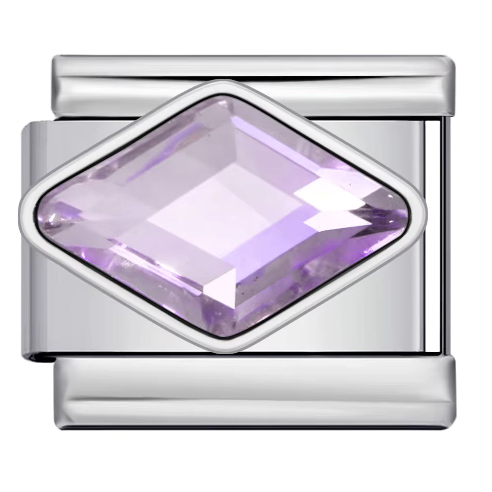Silver charm with a purple gemstone on a white background