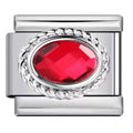 Silver charm with a red gemstone on a white background