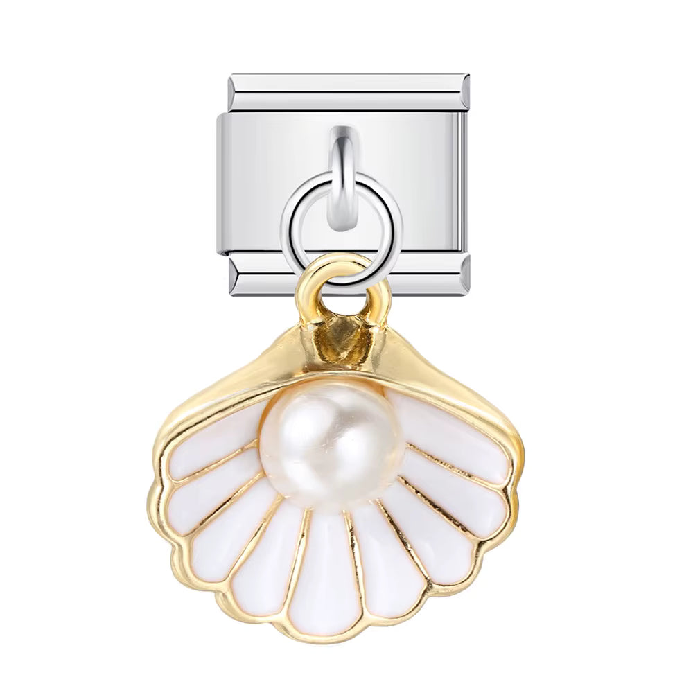 Jewelry charm with pearl and gold accents on a white background